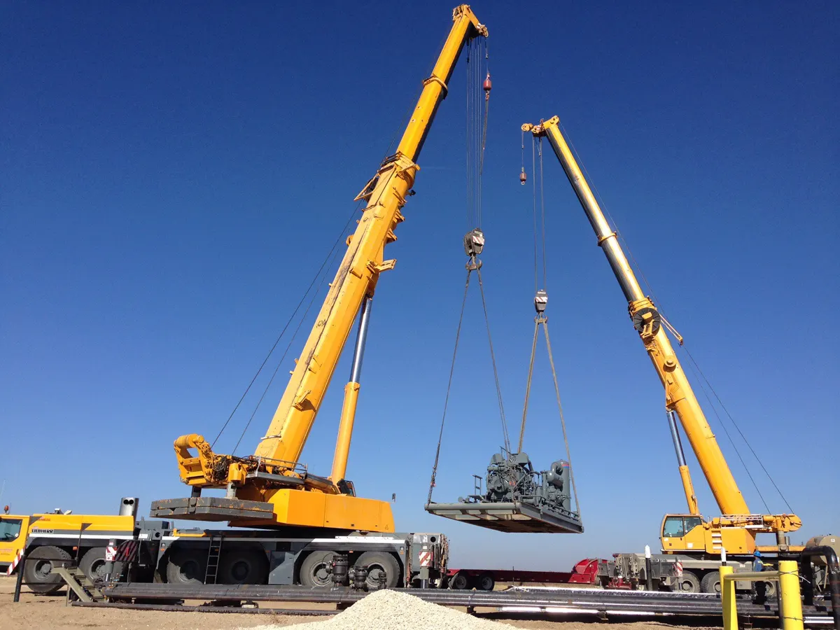Two Kran cranes in a tandem lift